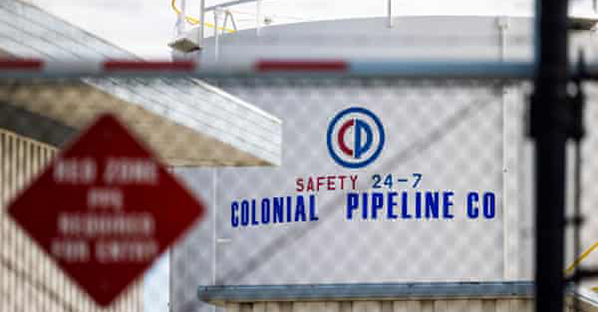 Colonial Pipeline silo through fence